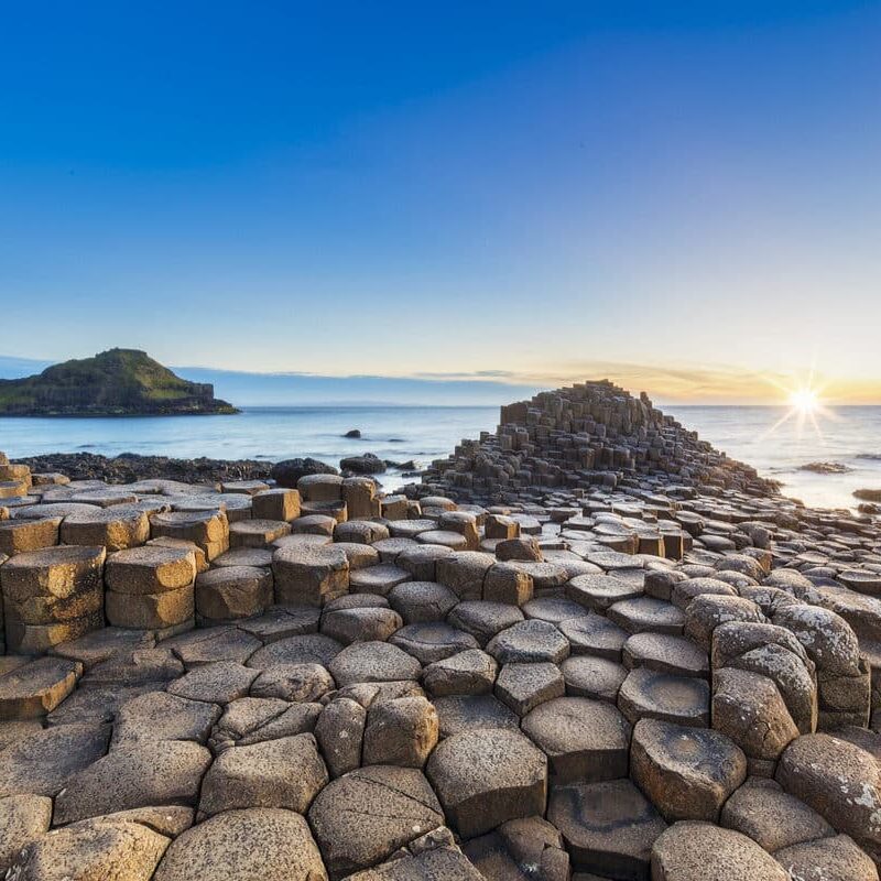 Sunset over Giants Causeway Northern Ireland - Hidden Ireland Hidden Ireland Accommodation Bed and Breakfast Cottage Rental
